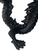Fragment ogona i tylnej części rzeźby smoka w stoliku Dragonized Bastard